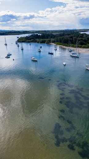 An aerial view of the city and boats in Port Macquarie, New South Wales, Australia