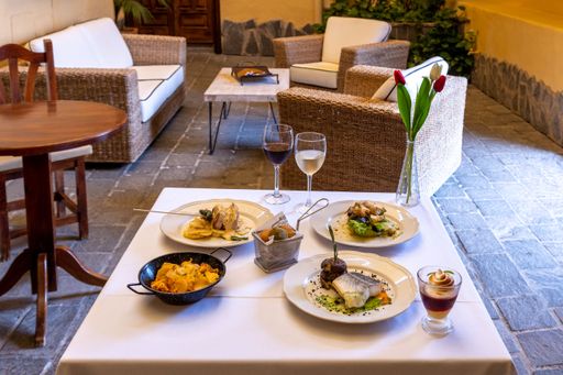 The tasty served dinner on the white table