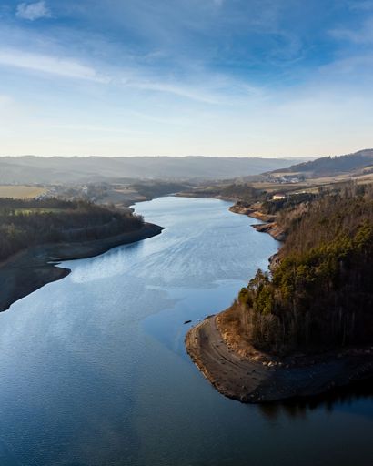 An aerial view of a river on a sunny day