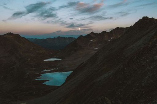 An aerial view of beautiful mountains during sunset