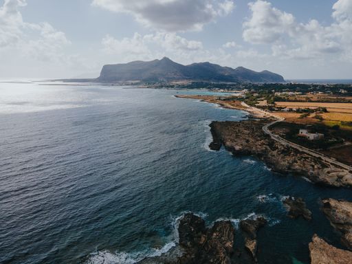 An aerial view of the Tyrrhenian sea and Favignana island on a summer day