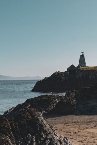A lovely view of Twr Bach lighthouse on the Llanddwyn Island in Anglesey, North Wales, a vertical shot