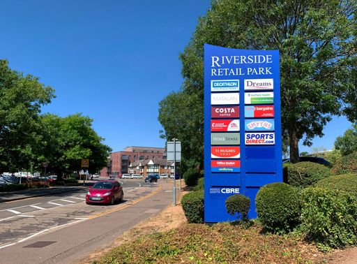 Signboard displaying the names of the business outlets at Riverside Retail Park in Victoria Road, Chelmsford, Essex, UK.