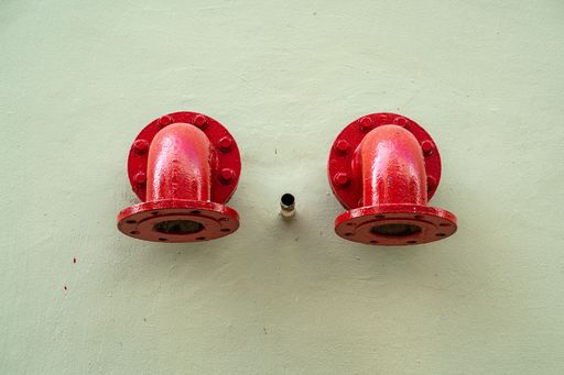 Standpipe wall hydrant to connect and support water to put out the fire in the building. Fire fighting system, safety, concept. Singapore.