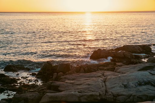 A bright golden sunset sky over Sea Point, Cape Town, South Africa