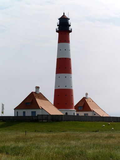 A vertical shot of Westerhever lighthouse in North Frisian Wadden Sea Pellworm Germany