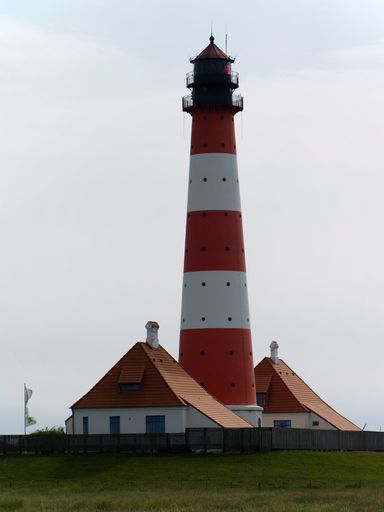 A vertical shot of Westerhever lighthouse in North Frisian Wadden Sea Pellworm Germany