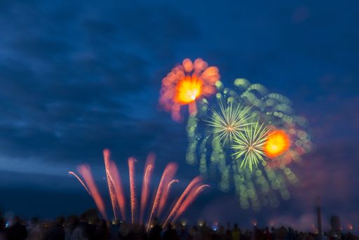 The beautiful colorful fireworks in the night sky - perfect for a background