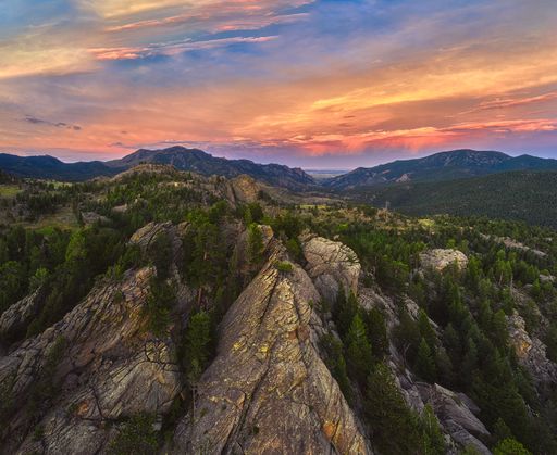 A breathtaking mountainous landscape under the sunset sky in summer