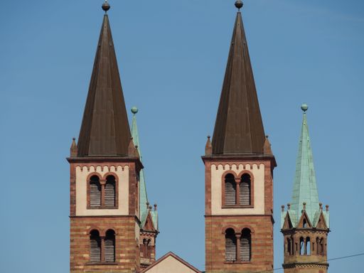 The towers of St. Kilian cathedral under the blue clear sky in Wuerzburg, Germany