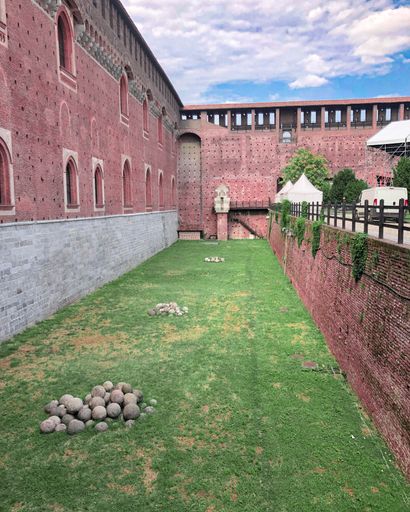 The yard of the Sforza Castle in Milan, Italy on a sunny day