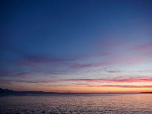 A stunning sunset over Lake Constance in Lindau, Bavaria, Germany.