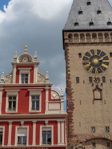 A beautiful shot of Old Gate historical landmark in Speyer, Germany under cloudy sky.
