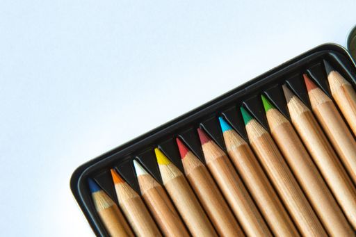 A beautiful set of colorful pencils stacked in a row