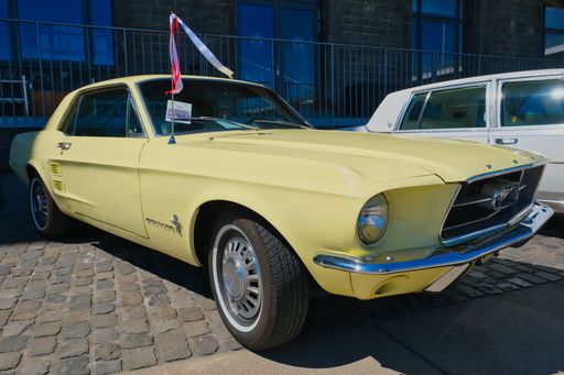 Ford Mustang from the sixties at the oldtimer exhibition in Cologne, diagonal view from the front