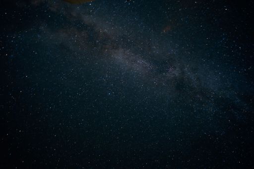 The Milky way galaxy with stars and space dust against a night sky background