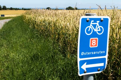 A closeup shot of the sign for the baltic sea Bikeline 8 in Denmark