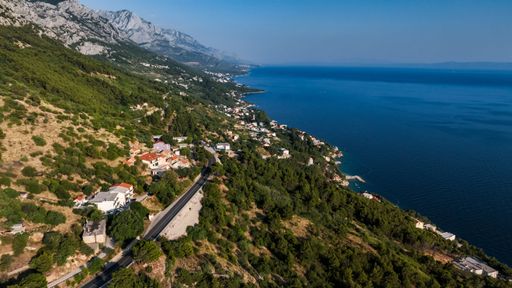 An aerial view of the Makarska Riviera on a sunny summer day in Croatia