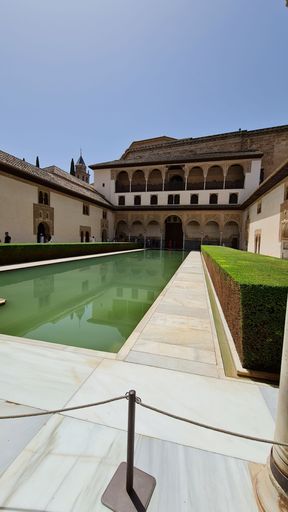 A vertical shot of Patio de los Arrayanes monument in Granada, Spain