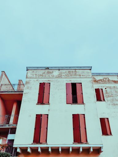 A low angle shot of a building under the peaceful sky