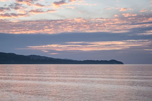 A breathtaking pink and blue cloudy sunset view over the sea near Montego Bay, Jamaica