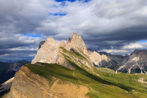 A beautiful scenic view of Seceda mountain under a cloudy sky, Dolomites, Odlegruppa, Southern Limestone Alps, Italy