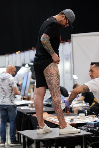 Krakow, Poland -  June 11, 2022: Unidentified  participant at 15th Tattoofest Convention in Cracow. One of the most prestigious tattoo festivals.