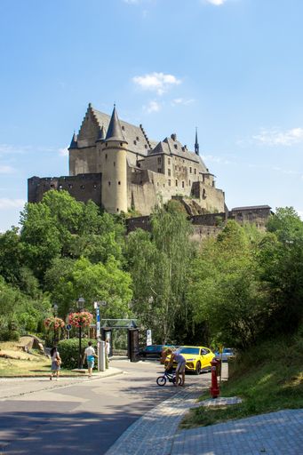 Lamborghini Urus at Vianden castle in Luxembourg on a hot day