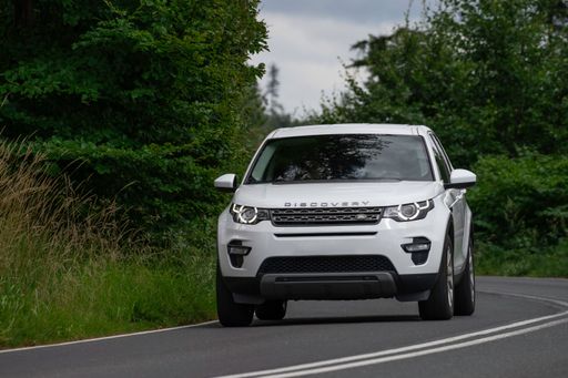 A white car on the road