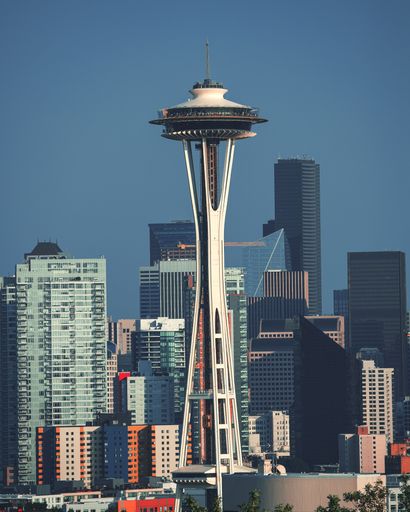 A vertical shot of the historic scenic Seattle skyline with the Space Needle across the water