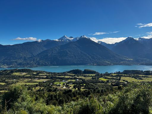A scenic shot of a lake next to the mountain range