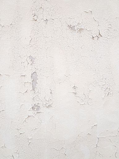 Distressed andTextured Painted White Wall