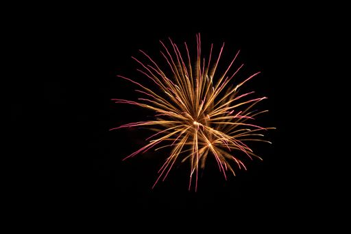 A beautiful shot of bright colorful fireworks on a black background