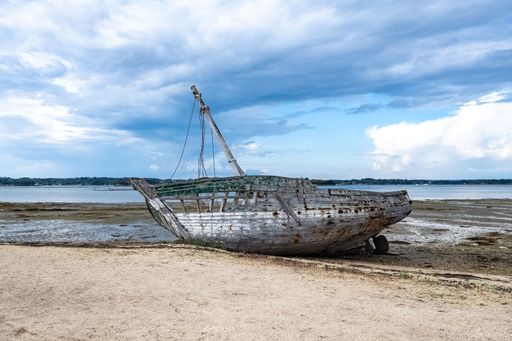 Brittany, Ile aux Moines island in the Morbihan gulf, beautiful beach at Penhap, with wooden wreck