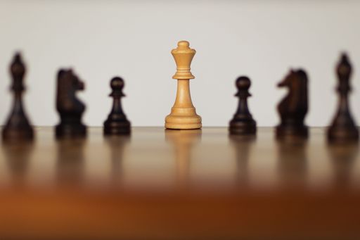 A board of chess games on a wooden table