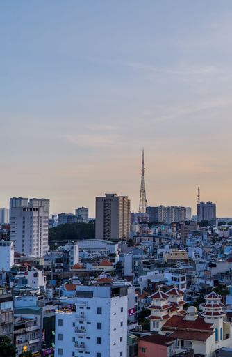 An amazing vertical sunset view of District 1 of Saigon in Ho Chi Minh City, Vietnam