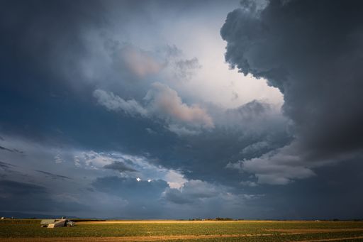 A mesmerizing view of scenic and cloudy sky above the field in Bavaria, Germany
