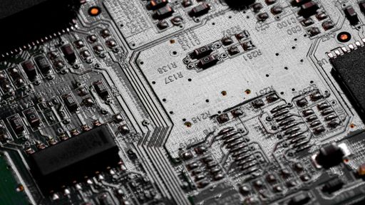 Macro Close up of components and microchips on PC circuit board	
