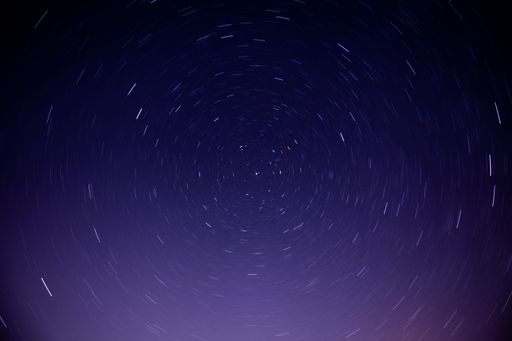 The Long exposure to the stars in the night sky, gives the imitation of rotating earth