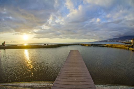 Sunrise on a Pier over Atlantic Ocean in Tenerife Canary Islands Spain