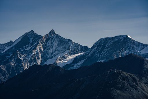 View of famous alpine 4000 m peaks Rimpfischhorn and Strahlhorn, Zermatt, Saas Fee, Switzerland.