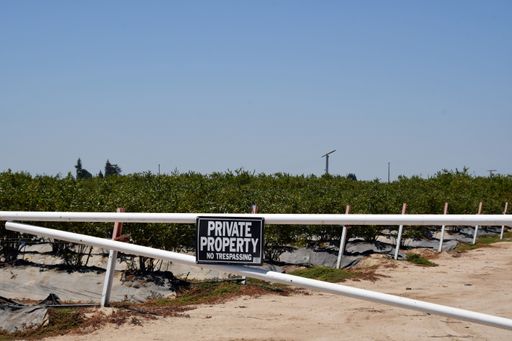 A closeup shot of a Private Property land with a restricting sign