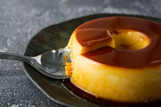 pudim de leite or milk pudding, traditional brazilian dessert with caramel also known as flan, high angle view