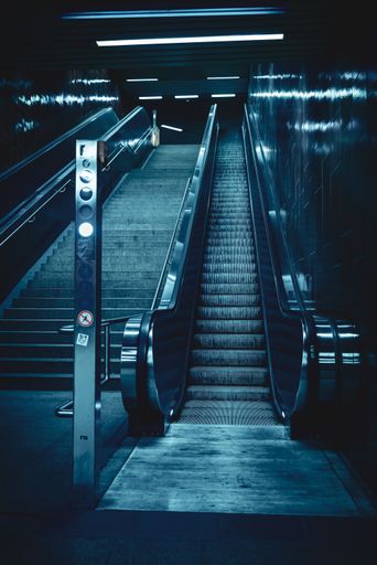 A vertical shot of a metro escalator