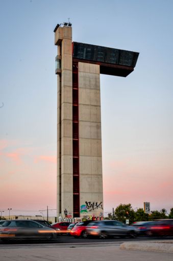 Picture of Urban Tower of the Mirador de Valencia With Car Lights Circling at Sunset
