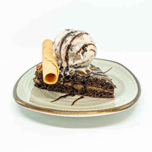 slice of dessert with ice cream