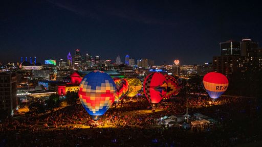 An aerial view of huge glowing hot air balloons at the National WWI Museum in Kansas City