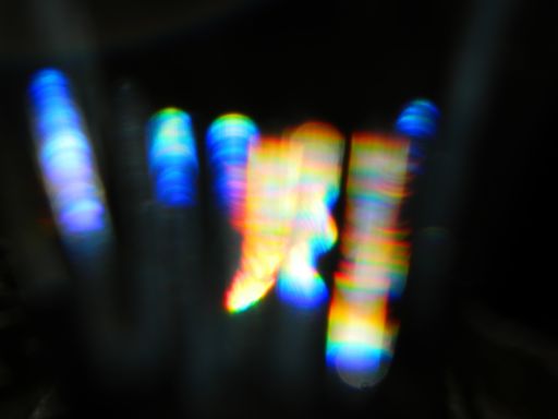 Rainbow light leaks and lens flares, beautiful design elements isolated on black backgrou