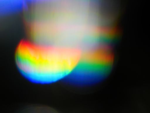 Rainbow light leaks and lens flares, beautiful design elements isolated on black backgrou