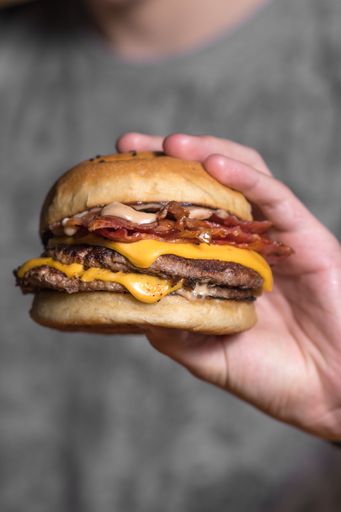 A vertical shot of a delicious burger